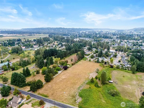 an aerial view of residential house with outdoor space