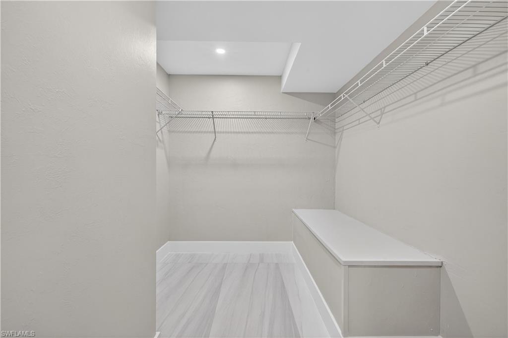 990 8th Street South, Unit 1C Naples, FL 34102 - Photo 15 of 24 a view of small space with racks on the wall