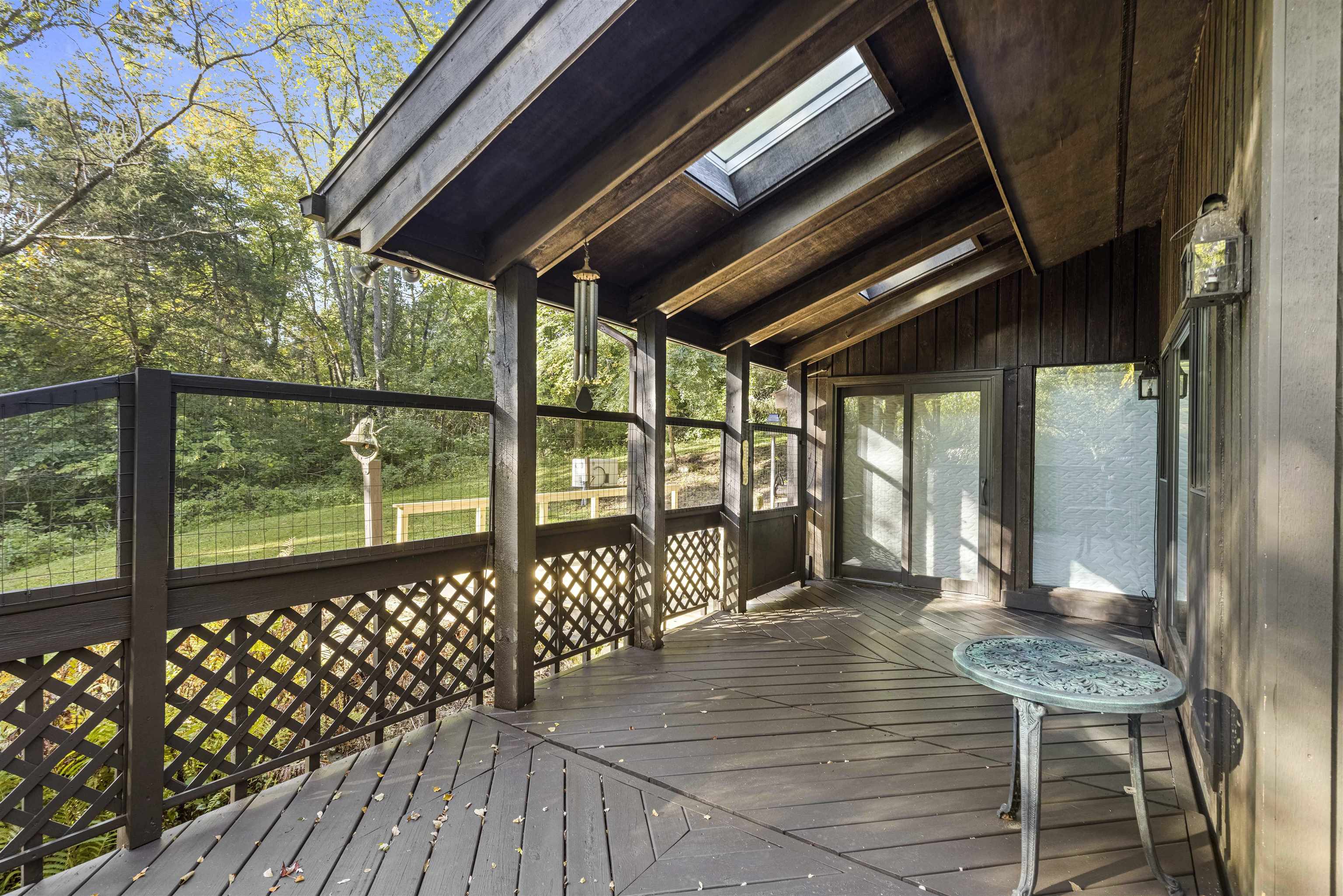 7145 South Rock Nation Road Dixon, IL 61021 - Photo 14 of 72 a view of a porch with wooden floor