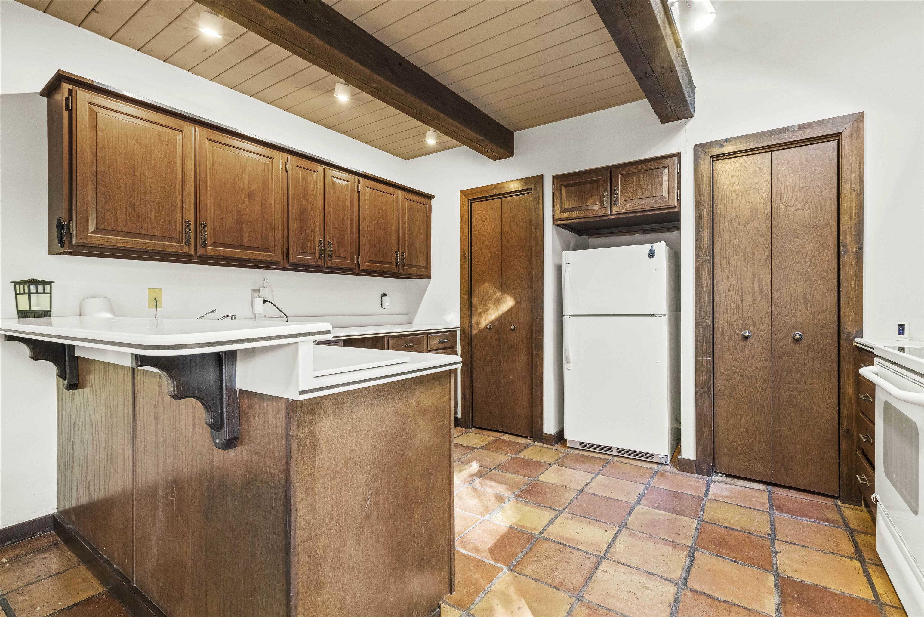 7145 South Rock Nation Road Dixon, IL 61021 - Photo 16 of 72 a kitchen with stainless steel appliances a refrigerator and a stove top oven