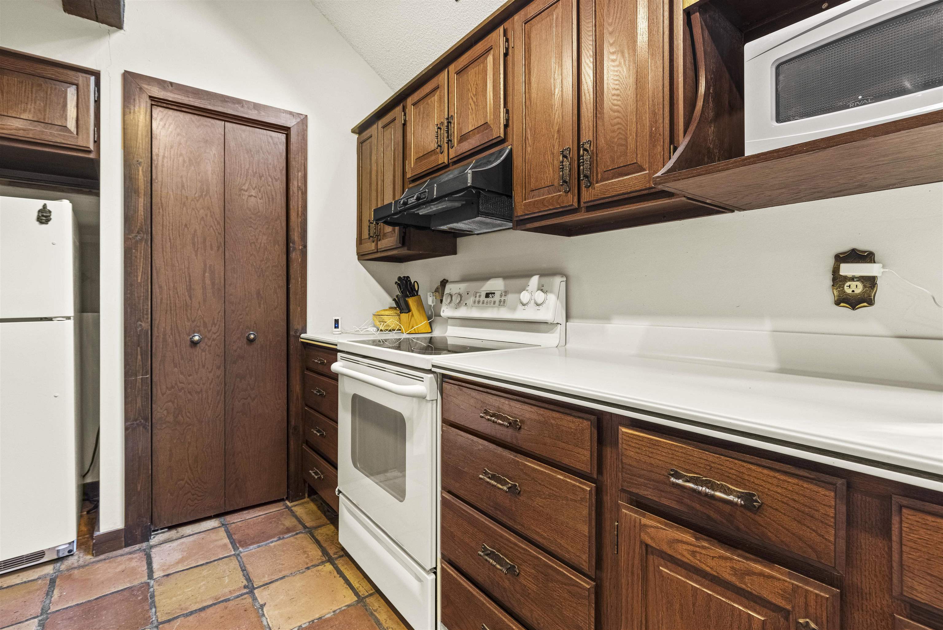 7145 South Rock Nation Road Dixon, IL 61021 - Photo 17 of 72 a kitchen with stainless steel appliances granite countertop a refrigerator and a sink
