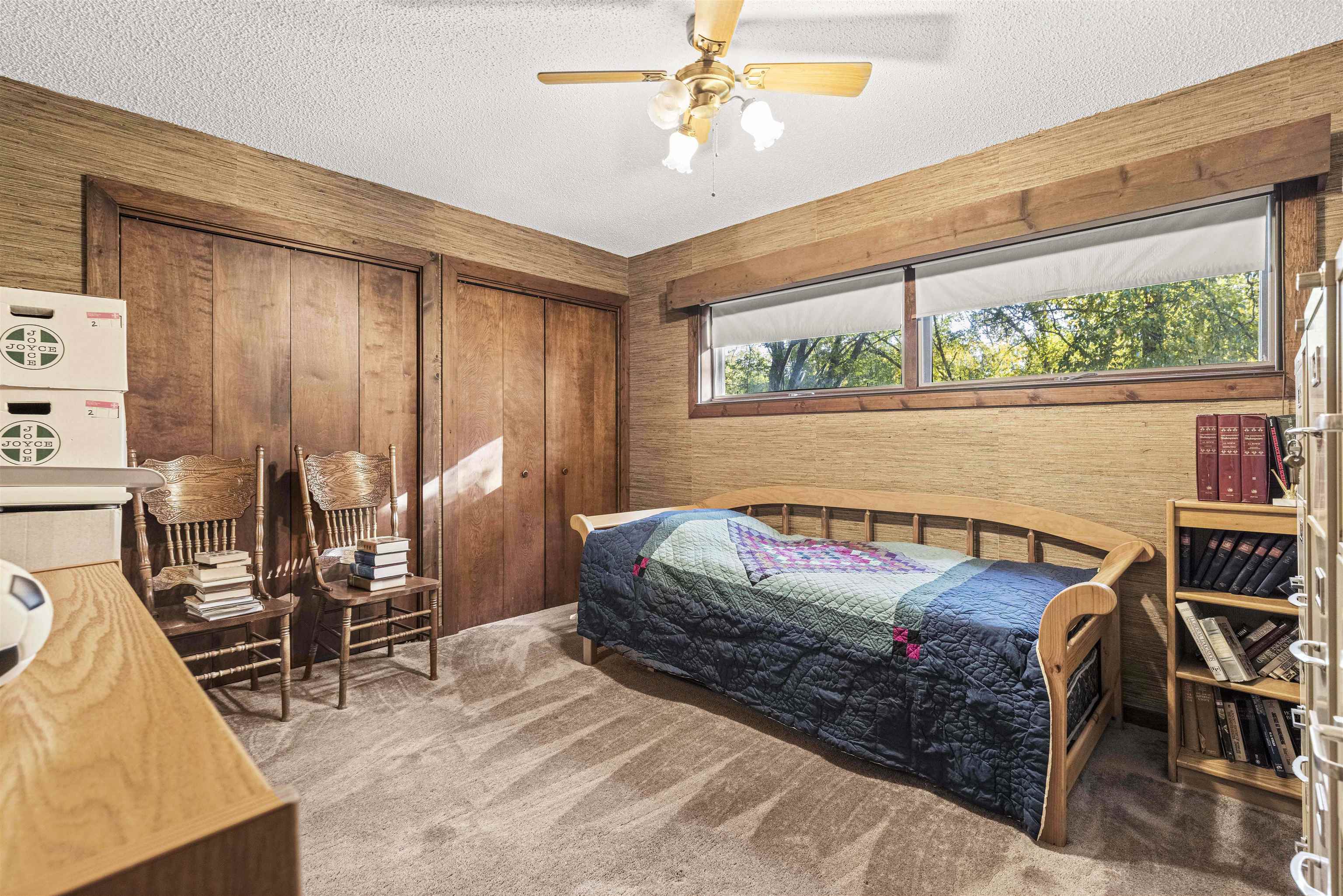 7145 South Rock Nation Road Dixon, IL 61021 - Photo 36 of 72 a bedroom with furniture and a large window