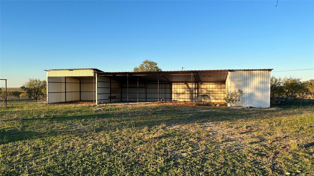 277 County Road 505 Goldthwaite, TX 76844 - Photo 9 of 14 a front view of a house with a yard