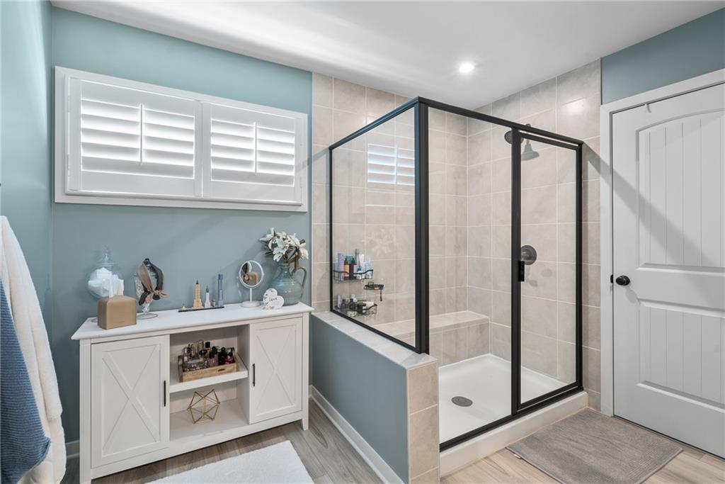 8530 Scenic Ridge Way Ball Ground, GA 30107 - Photo 22 of 45 a kitchen with stainless steel appliances granite countertop a refrigerator and a stove