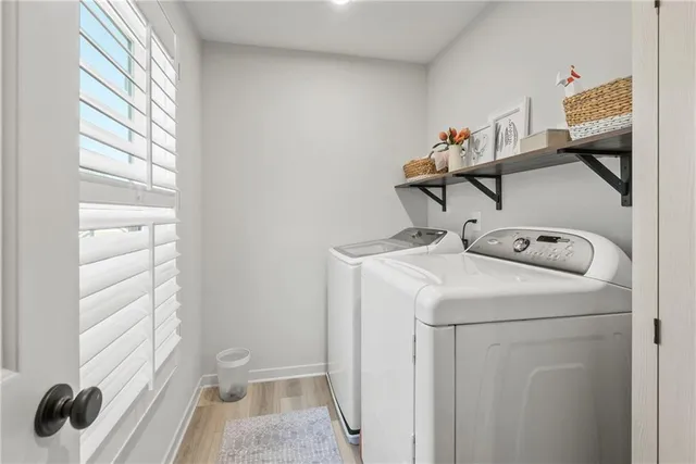 a utility room with dryer and washer