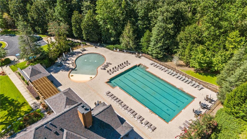 8530 Scenic Ridge Way Ball Ground, GA 30107 - Photo 41 of 45 a view of a swimming pool with a patio