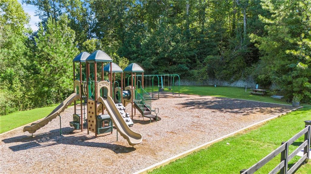 8530 Scenic Ridge Way Ball Ground, GA 30107 - Photo 45 of 45 a view of a house with a yard