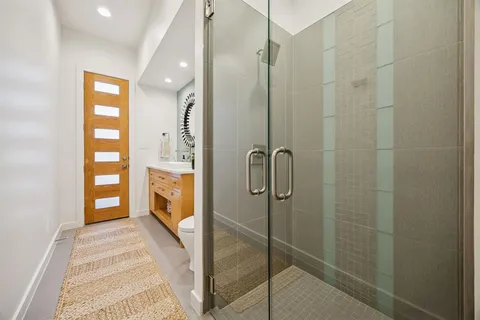 a utility room with sink dryer and washer