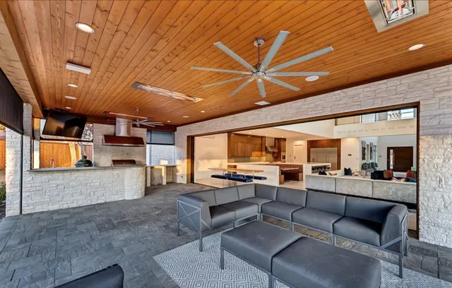 a outdoor space with lots of tables and chairs