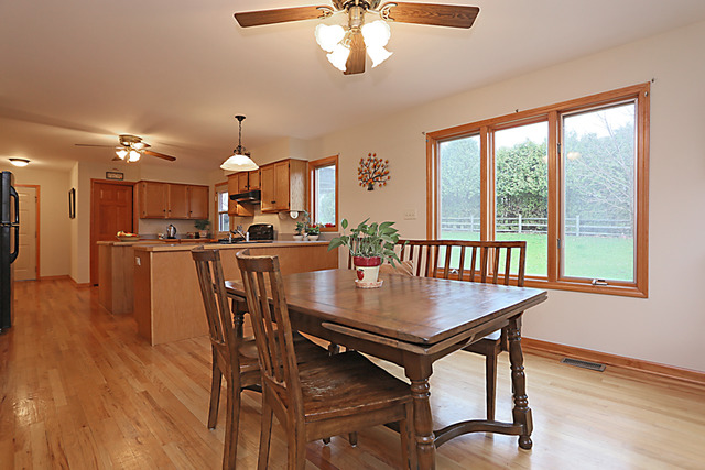 654 Ridge Drive Elburn, IL 60119 - Photo 7 of 25 a dining room with furniture and window