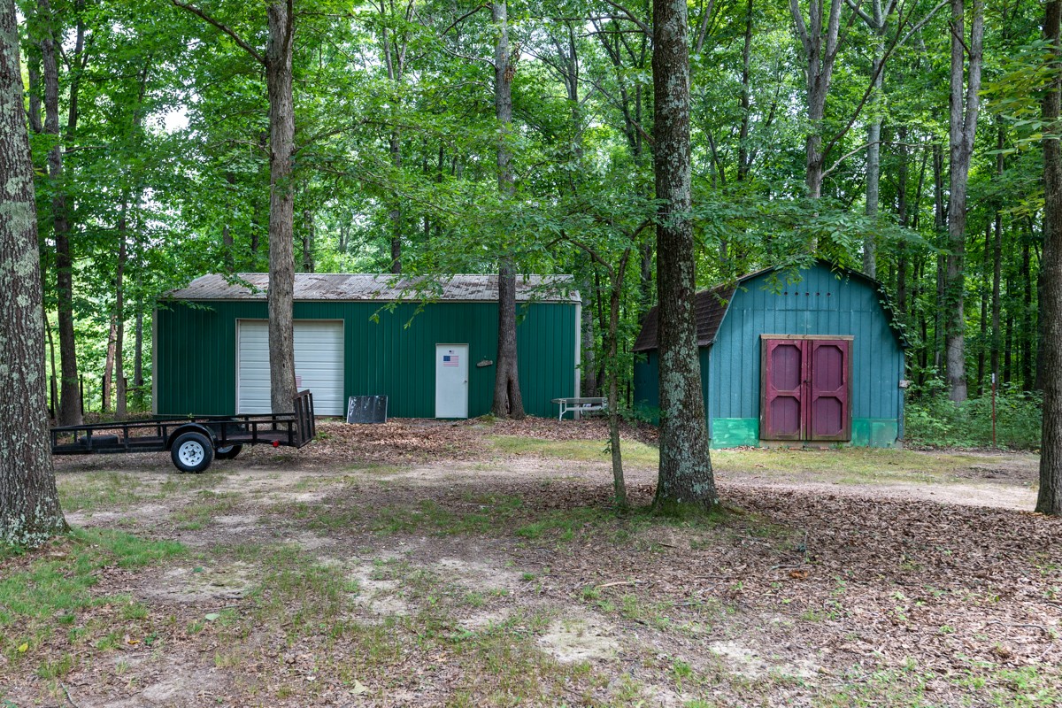734 Keytown Road Portland, TN 37148 - Photo 35 of 49 a view of a house with a yard and large tree