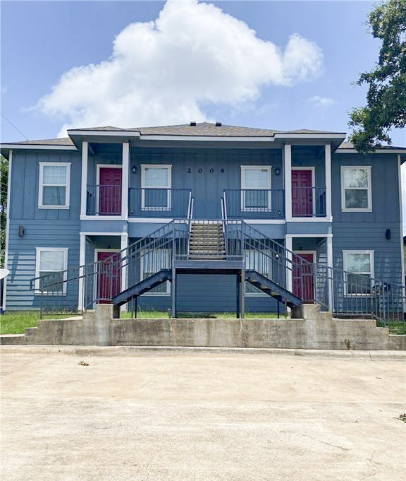 a view of house with outdoor space