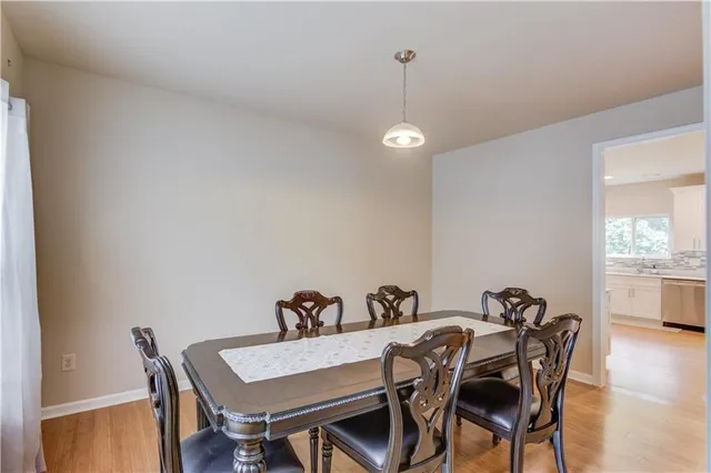 a view of a dining room and livingroom