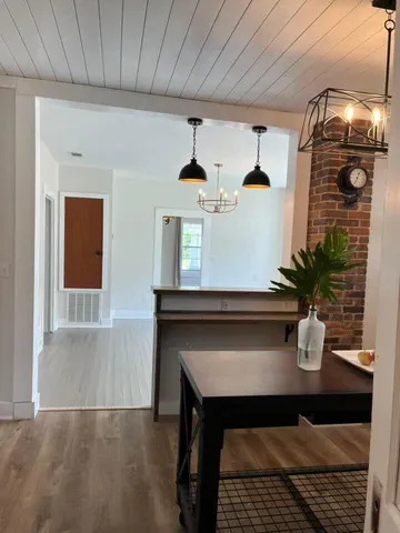 a room with a table and chairs