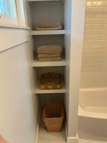 a room with a small stove