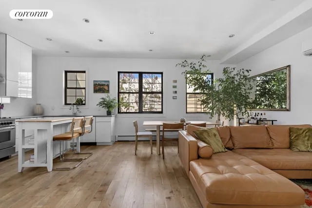 a living room with furniture and window