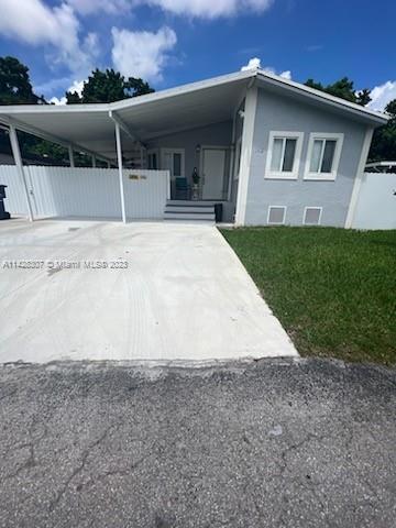 Gateway Estates Park Homestead, FL 33034 - Photo 4 of 26 a view of a house with a yard