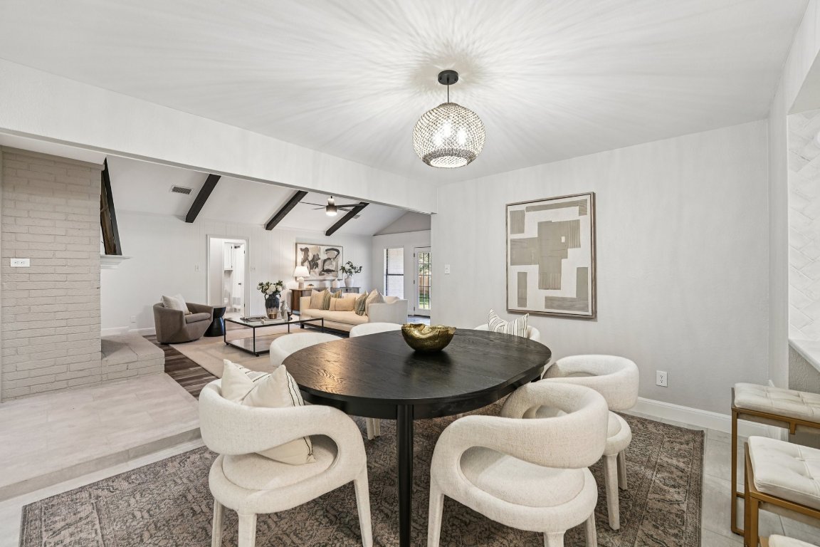 5307 Beckett Circle Austin, TX 78749 - Photo 10 of 29 Dining room with a ceiling fan and a chandelier