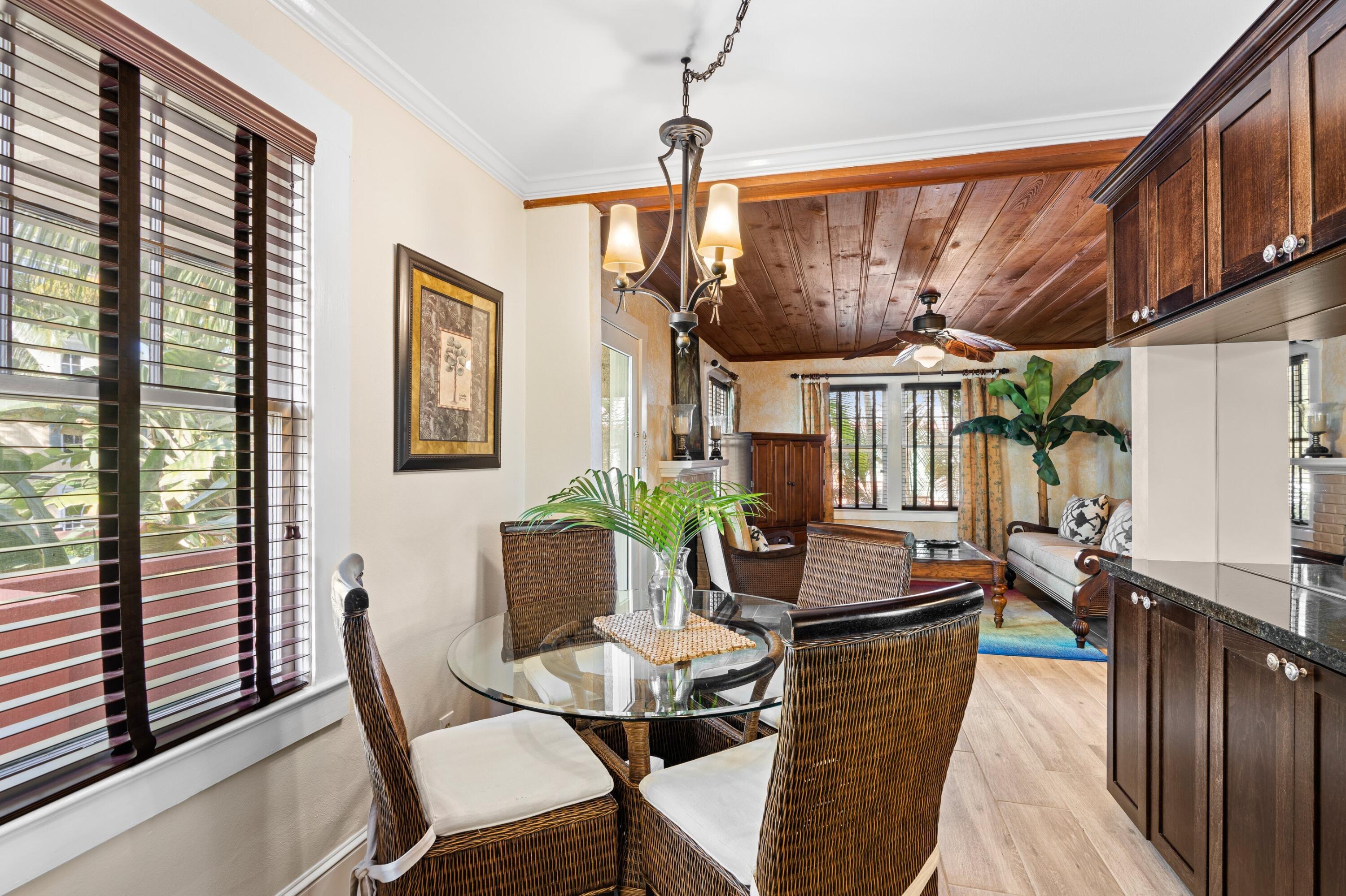 102 Southeast 7th Avenue, Unit VILLA 4 Delray Beach, FL 33483 - Photo 11 of 23 a view of a dining room with furniture window and outside view
