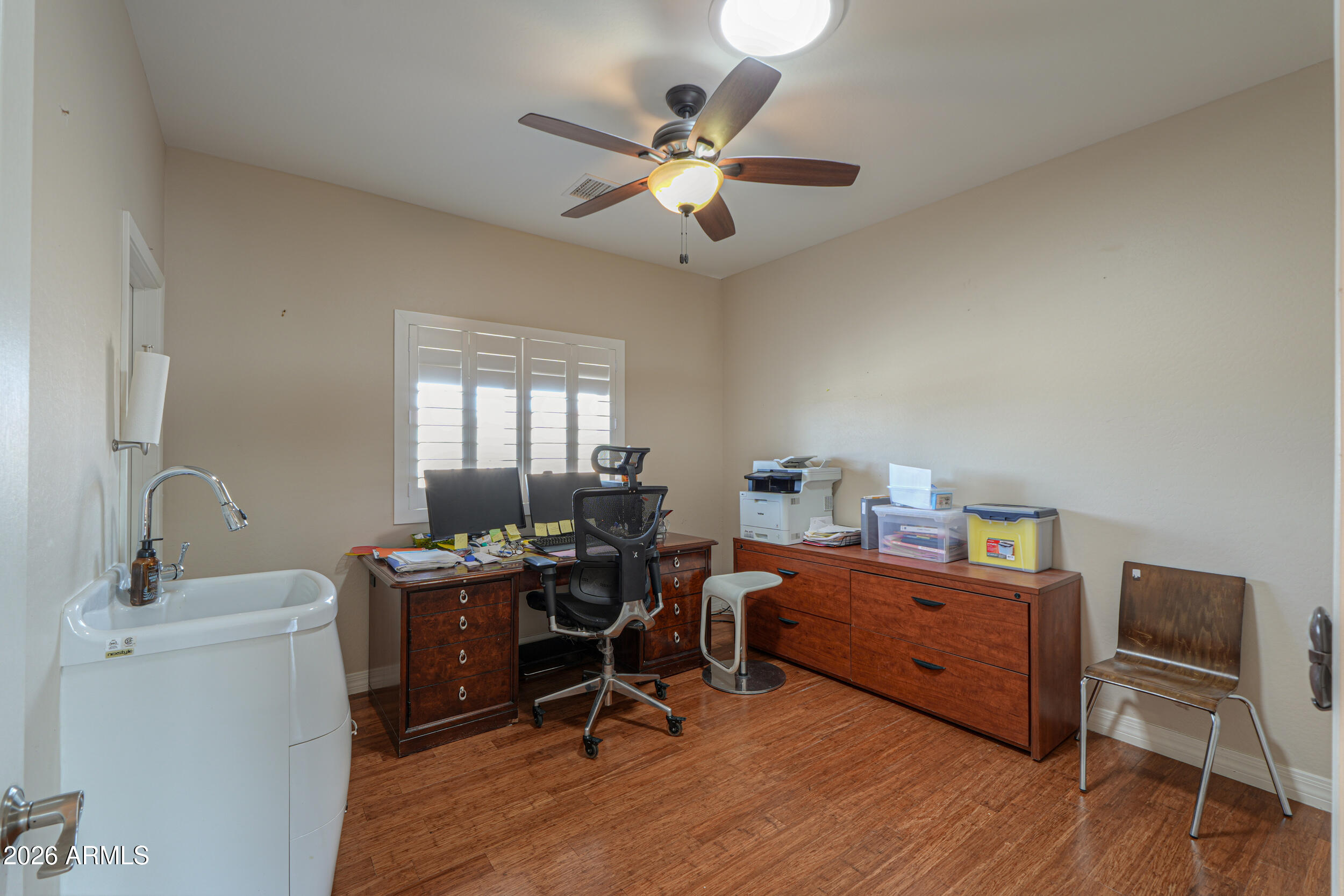 340 North Pottebaum Road Casa Grande, AZ 85122 - Photo 17 of 49 a view of a workspace with furniture and a window