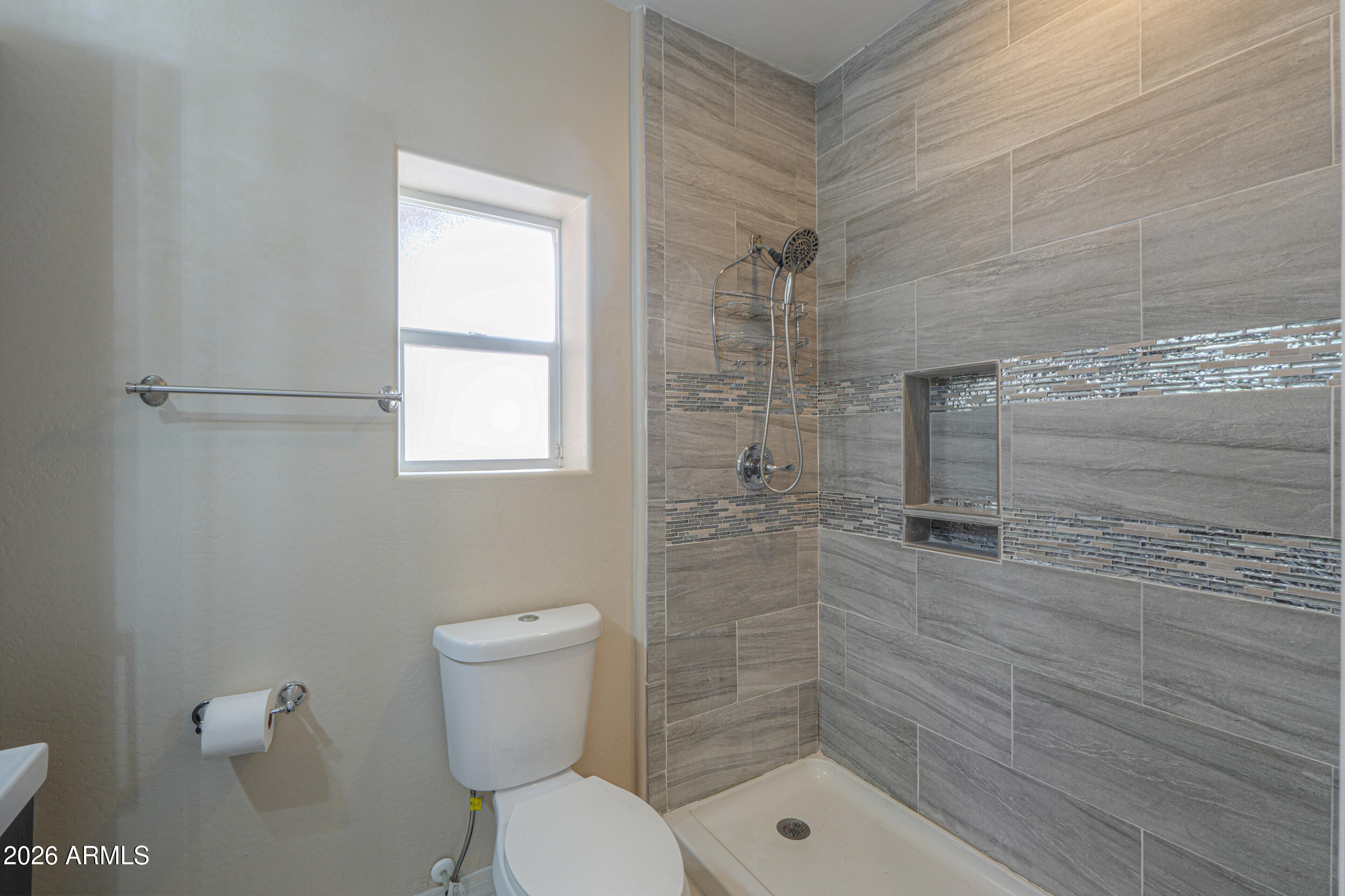 340 North Pottebaum Road Casa Grande, AZ 85122 - Photo 20 of 49 a bathroom with a toilet and a shower