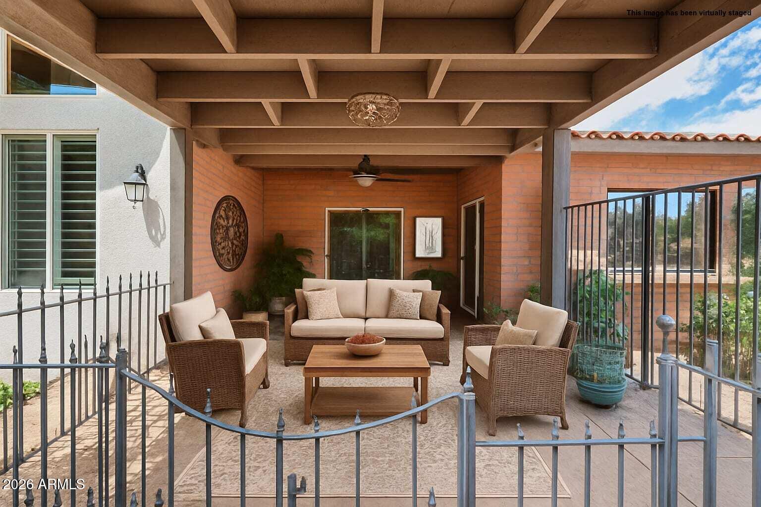 340 North Pottebaum Road Casa Grande, AZ 85122 - Photo 29 of 49 a living room with furniture and a large window
