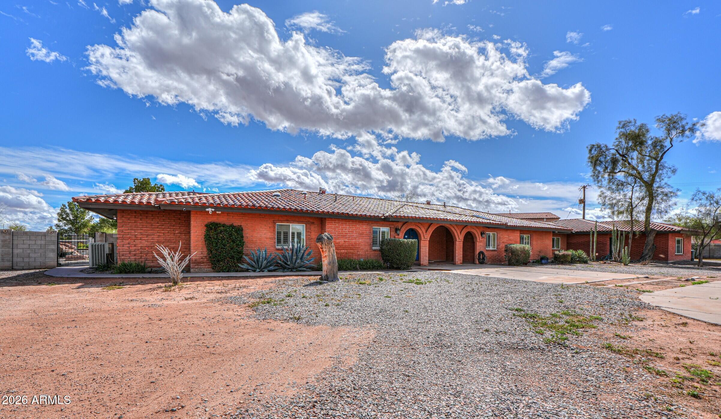 340 North Pottebaum Road Casa Grande, AZ 85122 - Photo 2 of 49 a view of a house with a yard