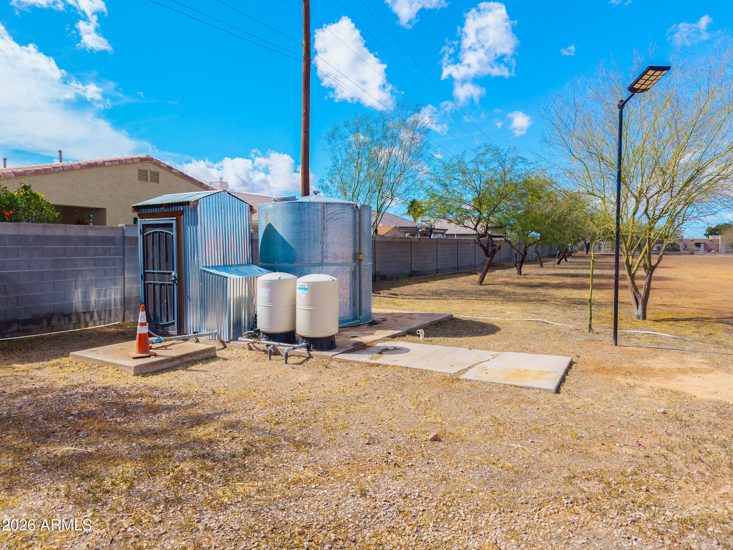 340 North Pottebaum Road Casa Grande, AZ 85122 - Photo 45 of 49 a view of a backyard with a tree