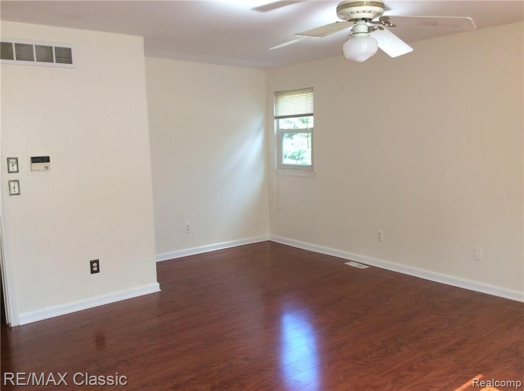 704 Burlington Road Canton, MI 48188 - Photo 31 of 40 Master w/ceiling fan and control panel for an optional security system