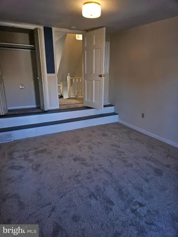 a view of a room with an empty space