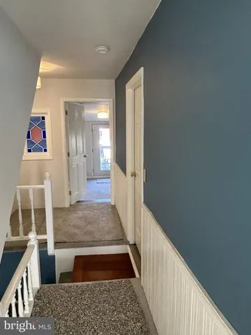 a front view of a house with parking space