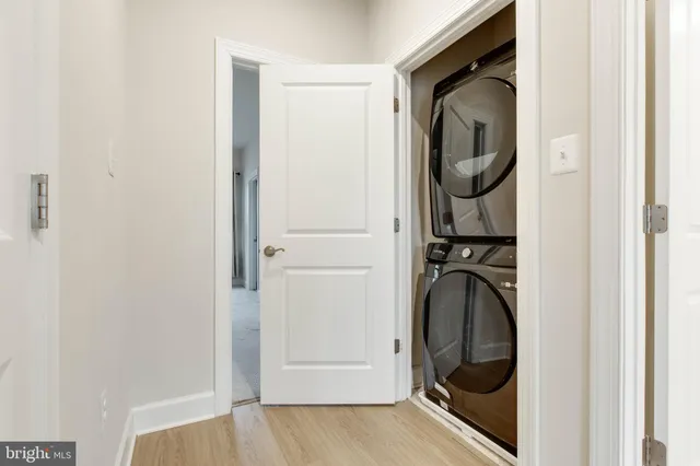 a close view of utility and utility room with washer and dryer