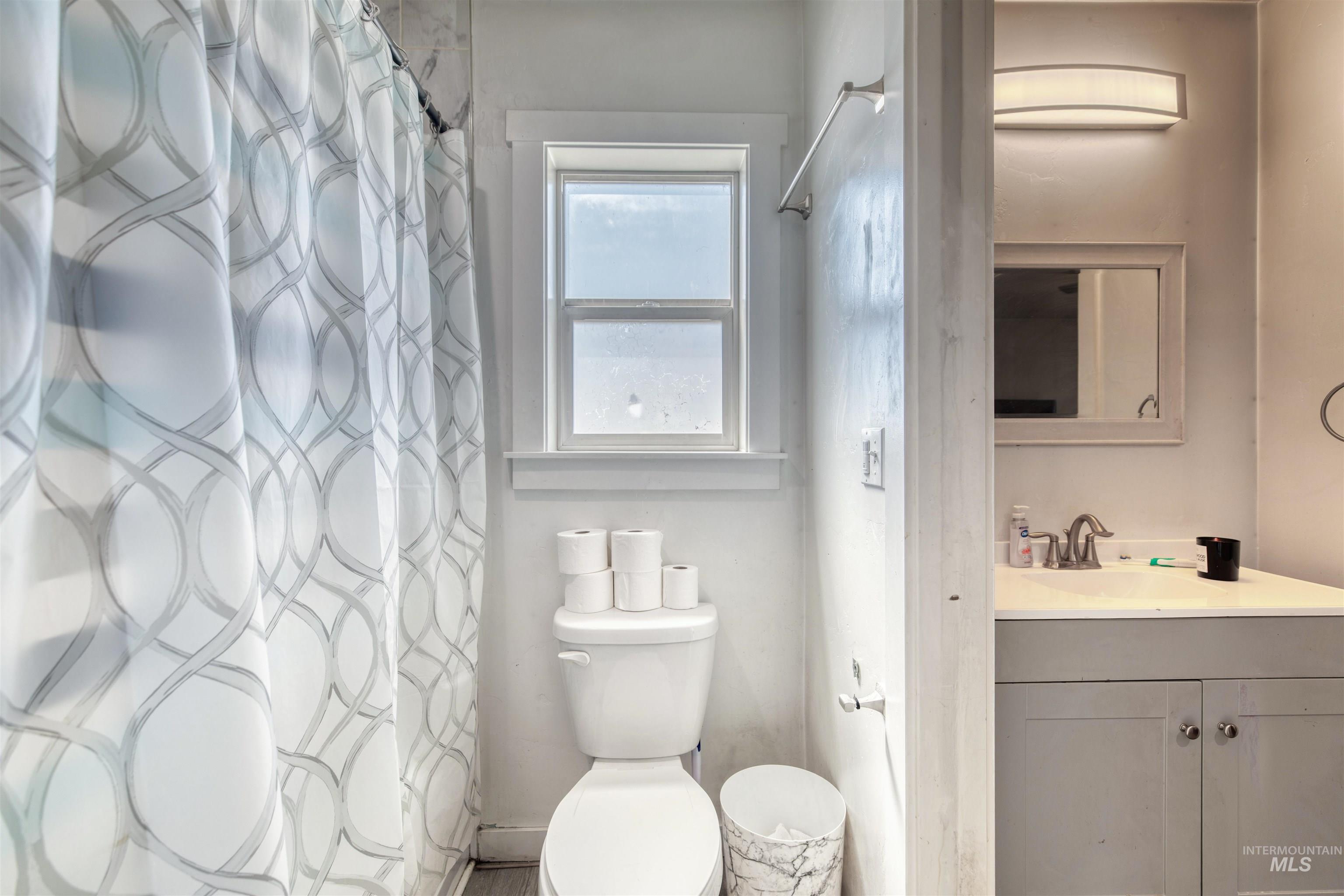 112 East Main Street Nyssa, OR 97913 - Photo 27 of 43 Full bathroom with vanity and a shower with curtain