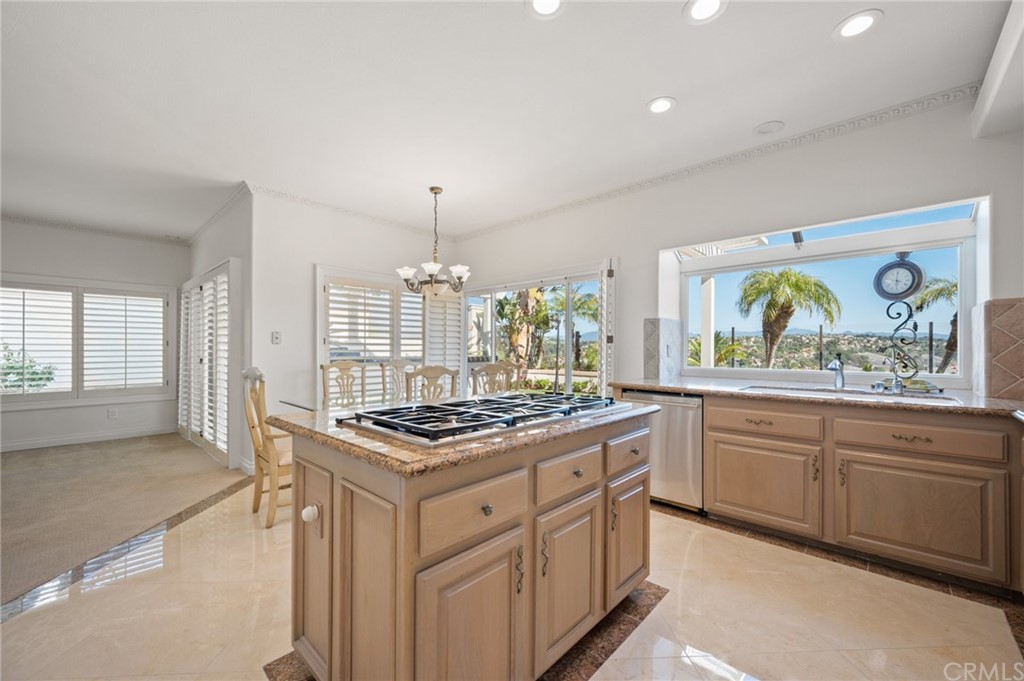 16 Charmony Laguna Niguel, CA 92677 - Photo 3 of 36 a kitchen with stainless steel appliances granite countertop a stove and a sink