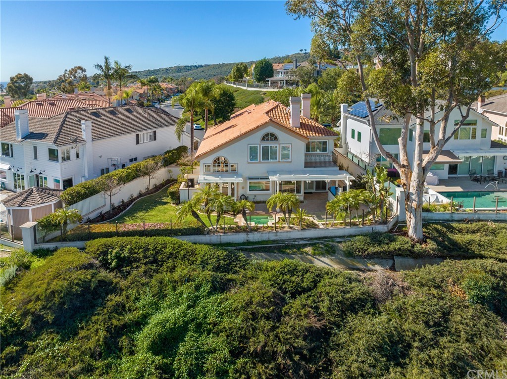 16 Charmony Laguna Niguel, CA 92677 - Photo 32 of 36 an aerial view of a house with a yard and large trees
