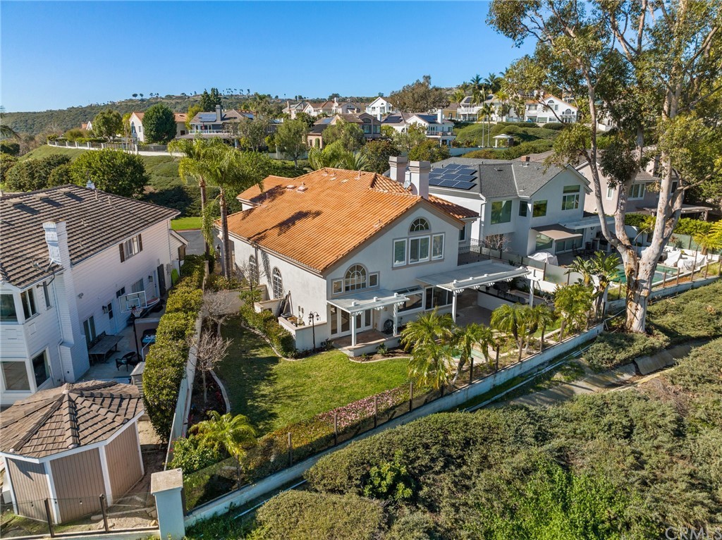 16 Charmony Laguna Niguel, CA 92677 - Photo 33 of 36 an aerial view of multiple houses with a yard