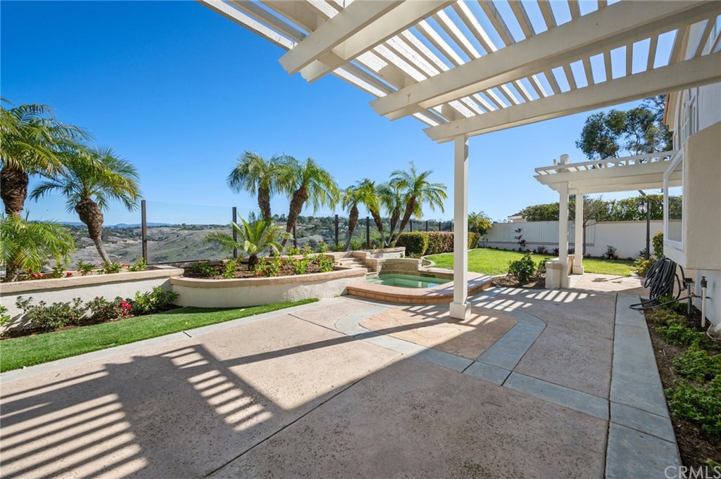 16 Charmony Laguna Niguel, CA 92677 - Photo 5 of 36 a view of a patio with swimming pool table and chairs