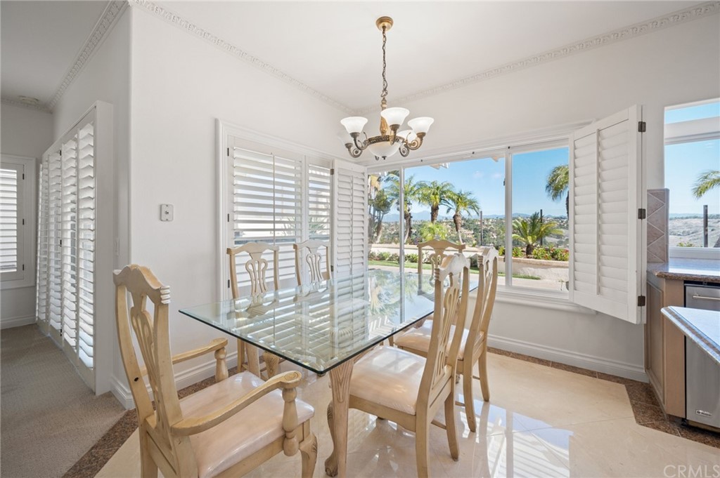 16 Charmony Laguna Niguel, CA 92677 - Photo 9 of 36 a view of a dining room with furniture window and outside view
