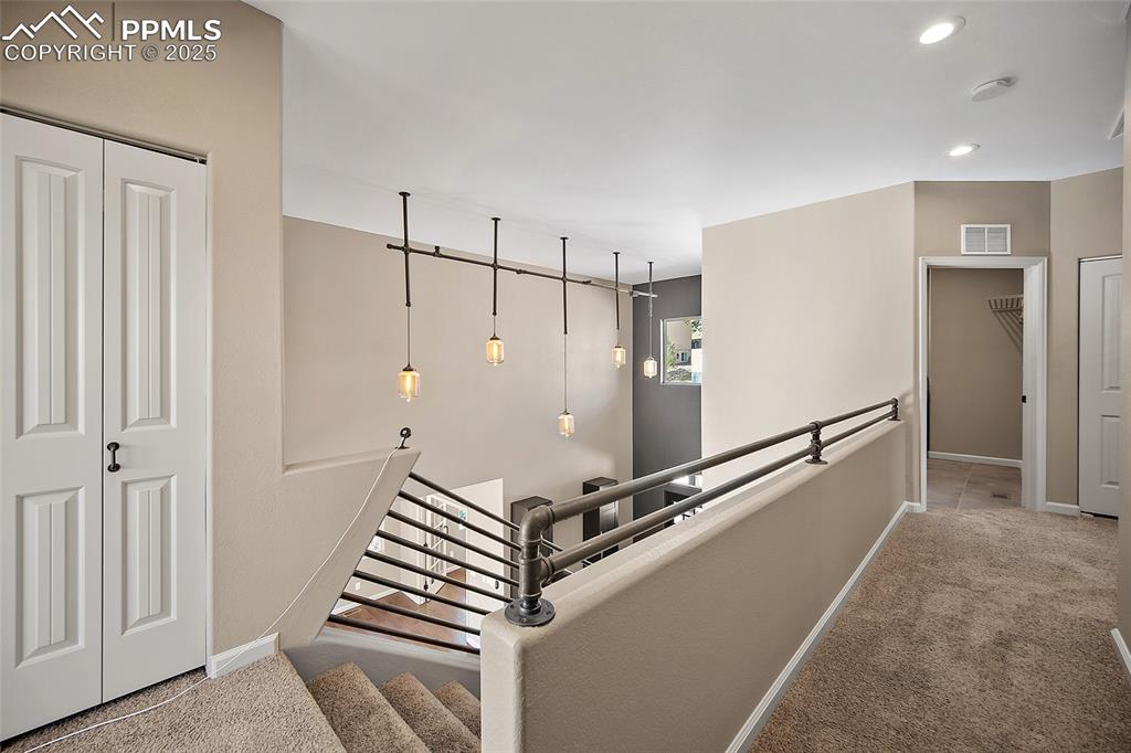 633 Tierra Verde Court Colorado Springs, CO 80904 - Photo 26 of 50 a view of a room with gym equipment