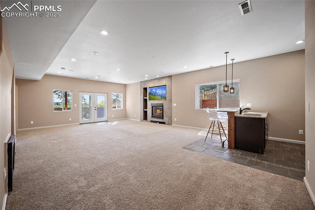 633 Tierra Verde Court Colorado Springs, CO 80904 - Photo 32 of 50 a view of a livingroom with furniture and window