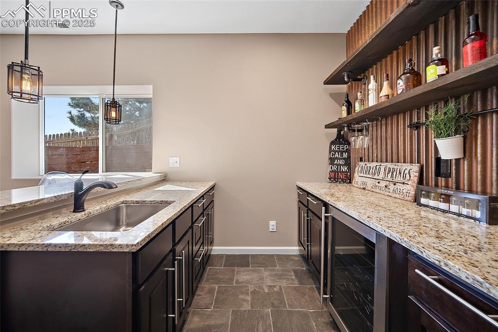 633 Tierra Verde Court Colorado Springs, CO 80904 - Photo 33 of 50 a kitchen with sink and cabinets