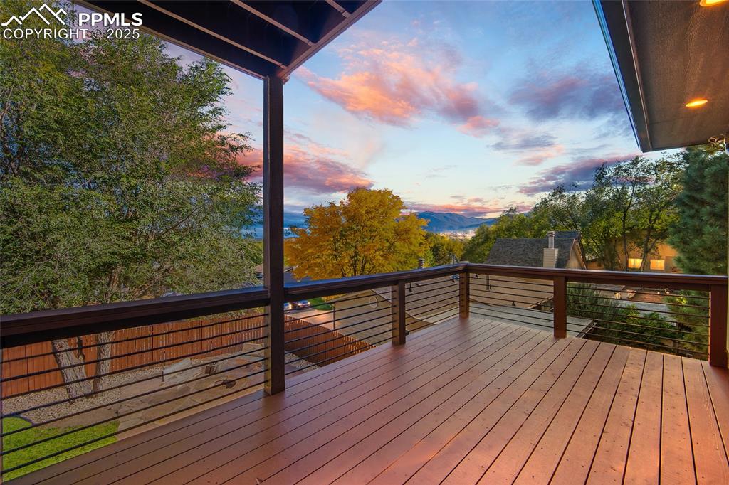 633 Tierra Verde Court Colorado Springs, CO 80904 - Photo 39 of 50 a view of balcony with wooden floor and fence