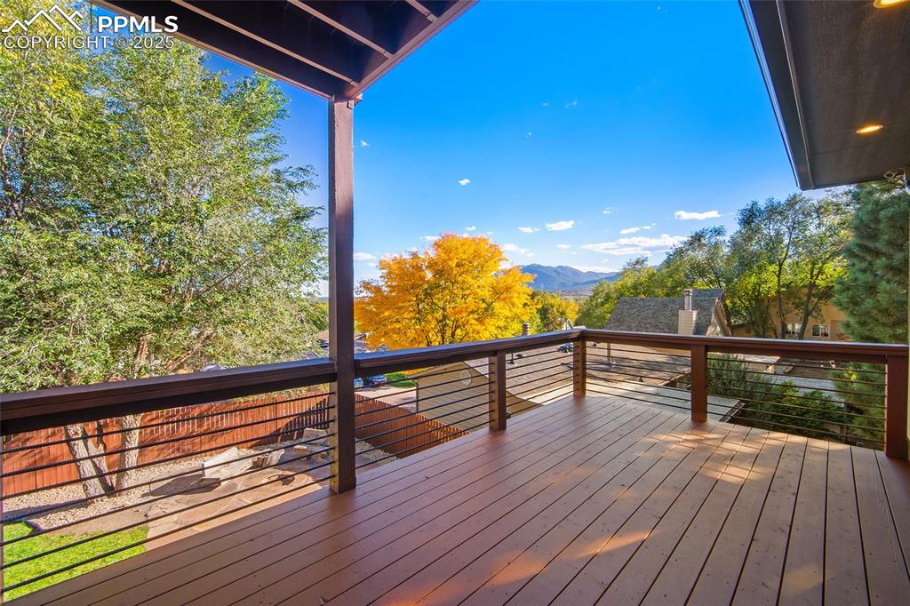 633 Tierra Verde Court Colorado Springs, CO 80904 - Photo 40 of 50 a view of balcony with wooden floor
