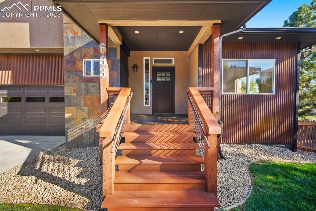 633 Tierra Verde Court Colorado Springs, CO 80904 - Photo 5 of 50 a view of an entryway with a house