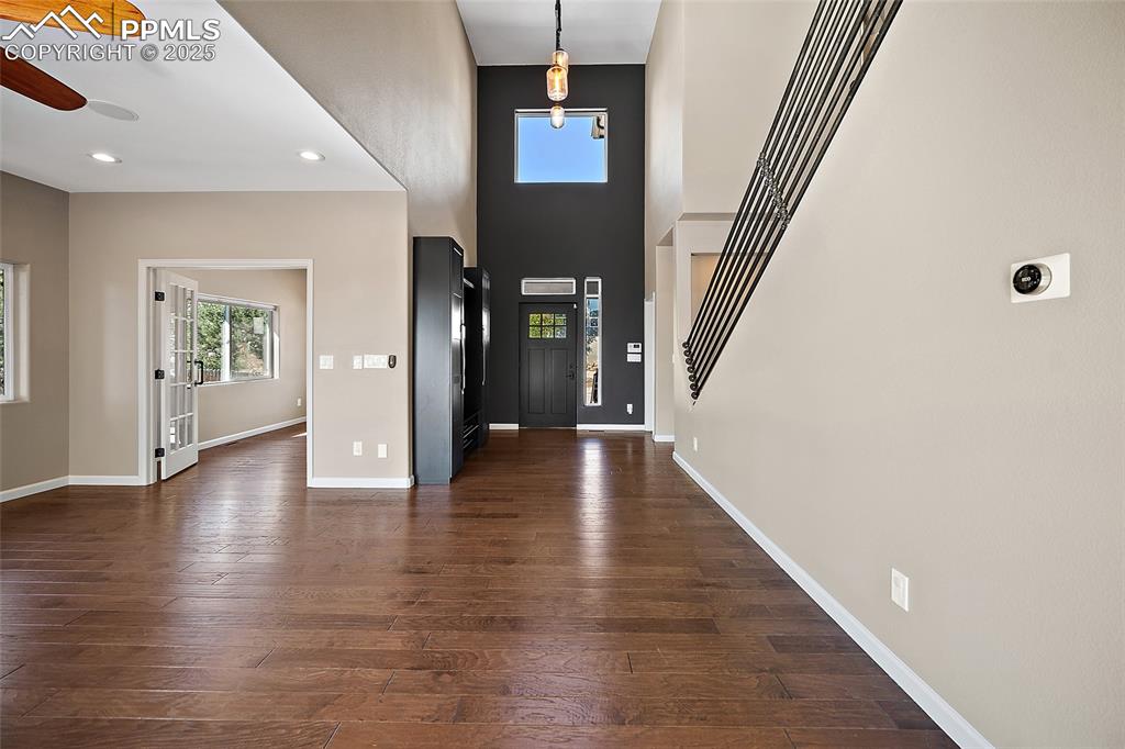 633 Tierra Verde Court Colorado Springs, CO 80904 - Photo 8 of 50 a view of an entryway with wooden floor