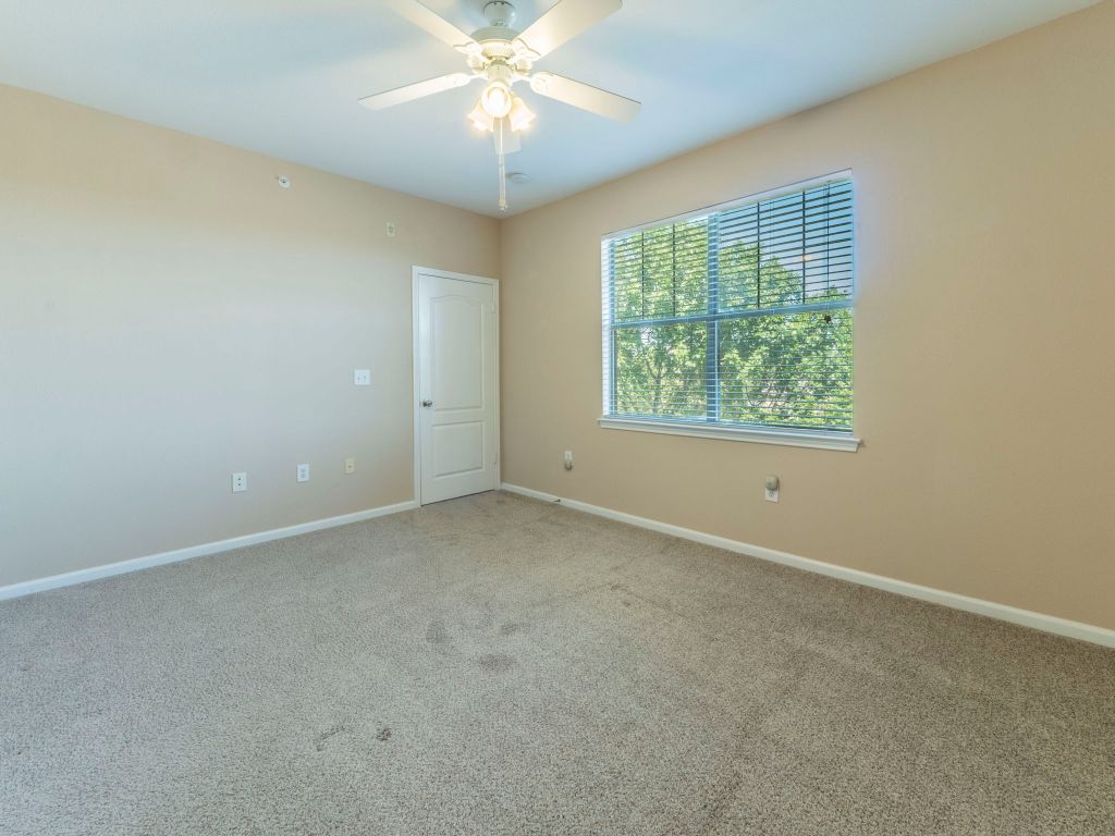 11203 Ranch Road 2222, Unit 107 Austin, TX 78730 - Photo 13 of 33 an empty room with a window