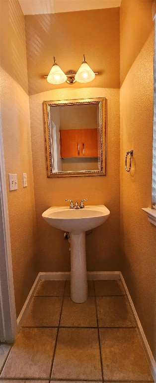11203 Ranch Road 2222, Unit 107 Austin, TX 78730 - Photo 18 of 33 a bathroom with a sink and toilet