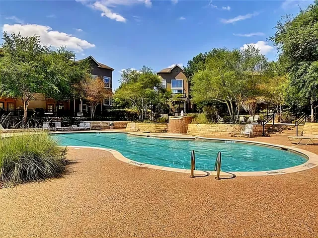 a view of outdoor space playground and lake view
