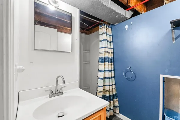 a room with lots of different colored cloths