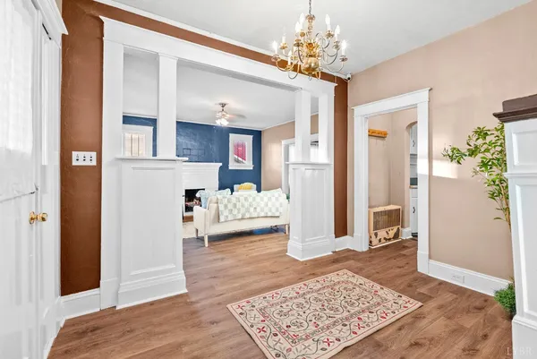 a bedroom with furniture and a rug